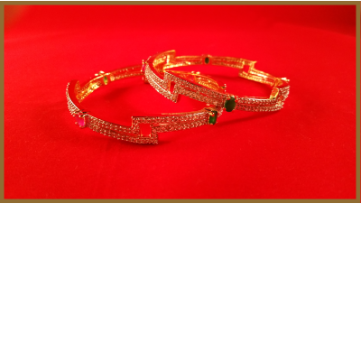 Zig Zag American Diamond Bangles With Ruby and Green Stones